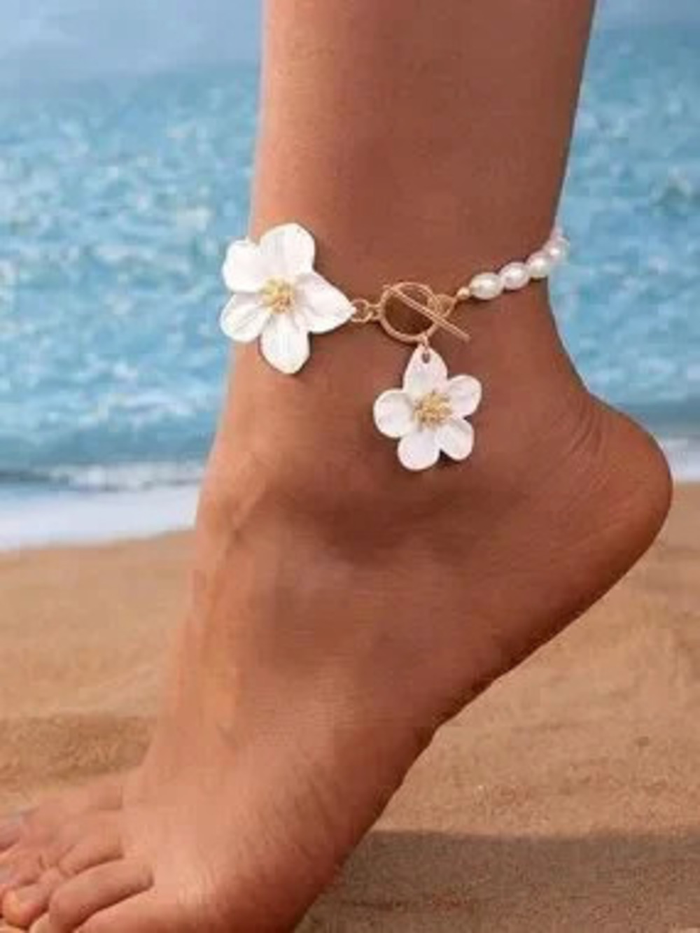 Anthropologie White Pearl Bracelet with Gold Floral Charms